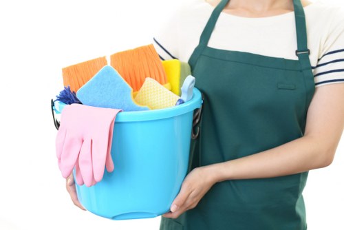 Carpet cleaning team preparing equipment safely before work begins